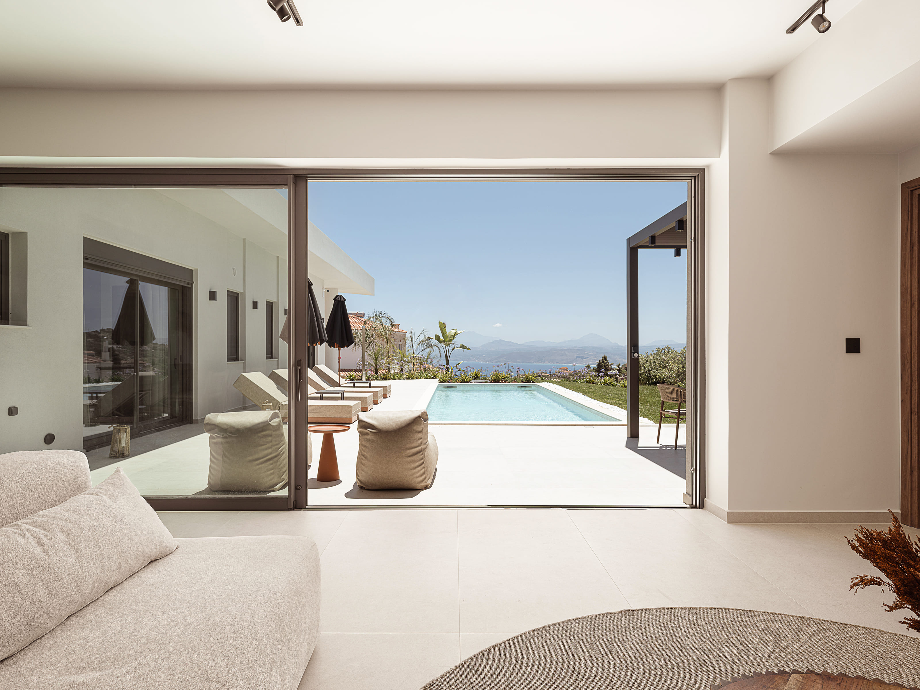 Poolside loungers with view